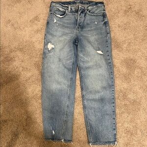 Women's Distressed Blue Jeans